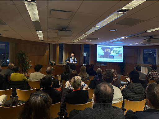 Ethan Zuckerman delivers an address at the Northeastern alumni center Nov. 15. Zuckerman, a public policy professor, spoke about the future of the digital public sphere. 