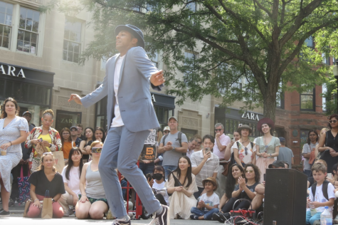 Andrade performs at Open Newbury street on a sunny afternoon. The street performer recently launched his NFT company Beauty in the Streets, which seeks to help ensure dancers’ choreography isn’t plagiarized.