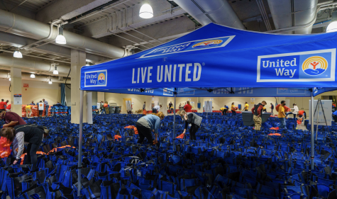 Volunteers fill bags with resources at the 22nd annual Thanksgiving Project at United Way of Massachusetts Bay and Merrimack Valley in 2021. Photo courtesy of United Way.