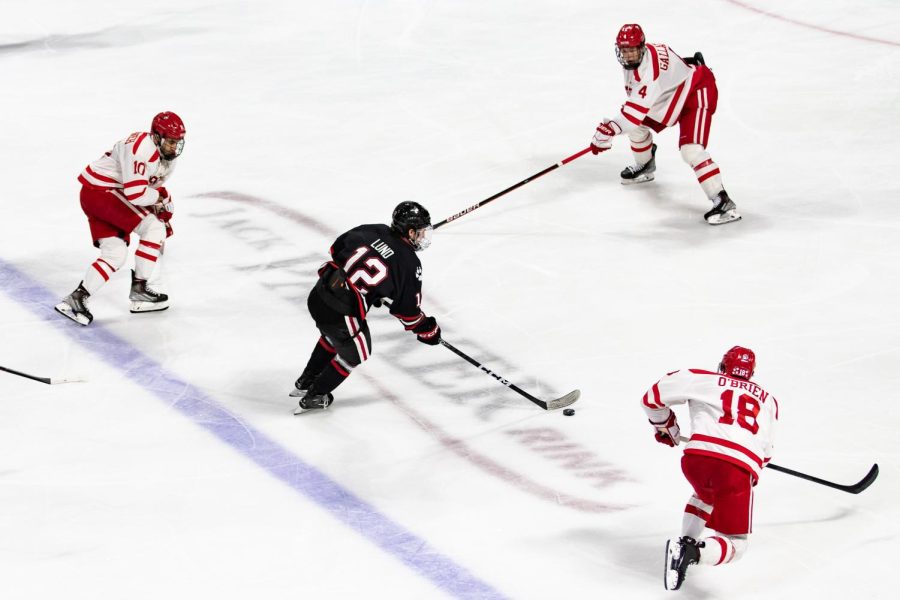 Lund races up the ice to net the Huskies first goal at Boston University Nov. 18. Lunds tally broke the scoring drought and gave Northeastern a 1-0 lead with just under nine minutes left in the game.