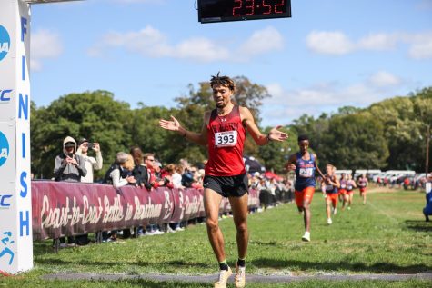 Alex Korczynski crosses the finish line at the Battle in Beantown Invitational. Photo courtesy of Jim Pierce. 