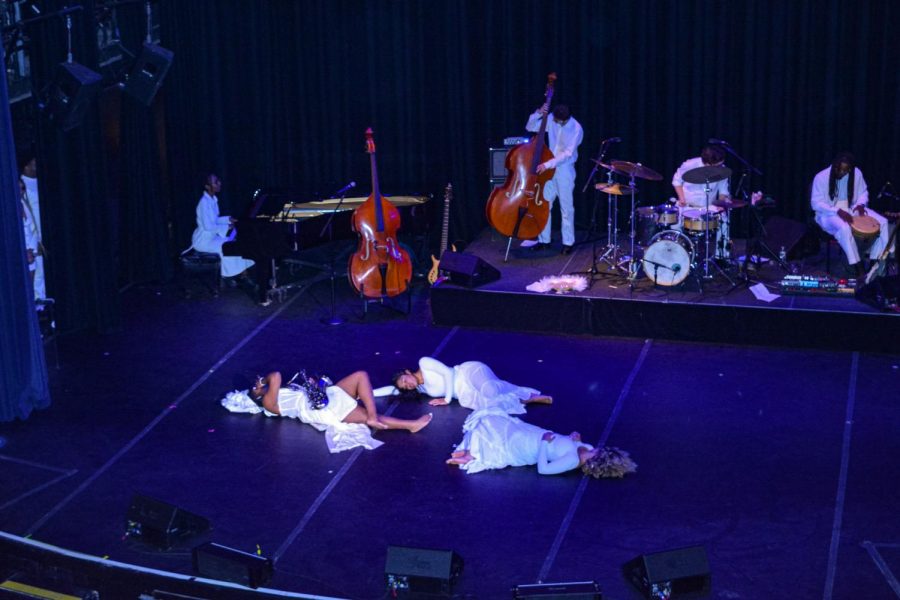 Orji, Delgado and Quinones lie sprawled on the stage floor to pay homage to Orjis brother during “Thunder of Michael’s Roar.” The scene depicted their childhood experience.