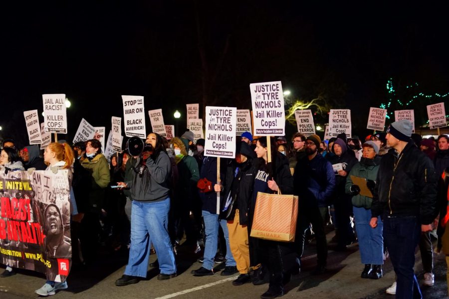 Protesters march around the perimeter of the Boston Common Friday night holding signs stating “Jail all racist killer cops,” “Stop the war on Black America” and “Justice for Tyre Nichols. Jail killer cops!” The demonstration was organized quickly after the videos of Nichols’ killing were released earlier that evening.
