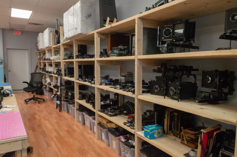 Dozen of analog cameras sits on shelves inside CatLABS in Jamaica Plain. The store was started in 2011.