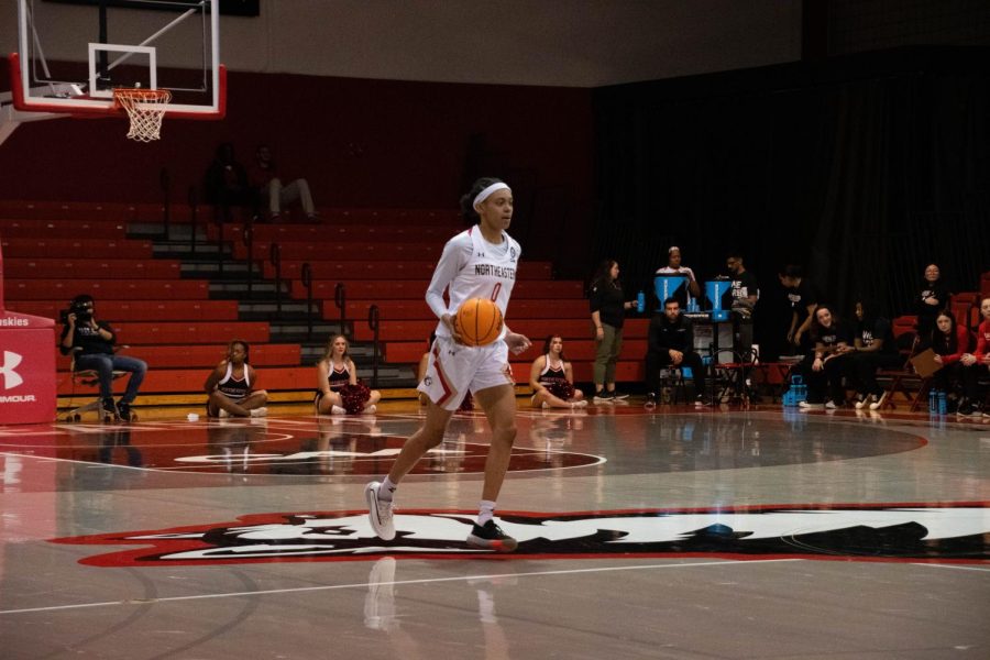 Senior guard Jaelyn Batts brings the ball down the court. Batts was a starter in the Huskies Sunday afternoon win over Hofstra. 