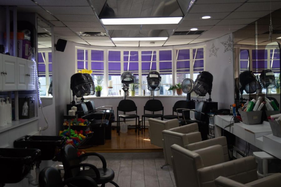 Hair dryers, curlers and chairs are set up for customers in Lizs Hair Care, a salon focusing on teaching people how to best take care of their hair texture and type. Hair has held great cultural and spiritual significance for Black Americans. 