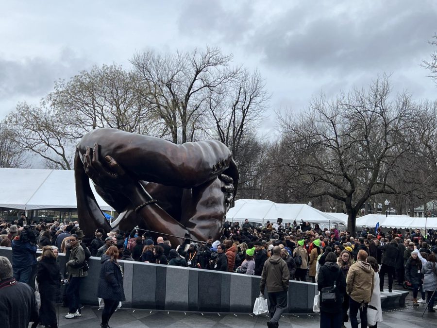 Hundreds+gather+to+witness+the+unveiling+of+%E2%80%9CThe+Embrace%E2%80%9D+in+Boston%0ACommon+Jan.+13.+The+sculpture+honoring+Dr.+Martin+Luther+King+Jr.%0Awas+modeled+off+a+photo+of+him+and+his+wife%2C+Coretta+Scott+King%2C+who%0Aembraced+after+learning+he+won+the+1964+Nobel+Peace+Prize.