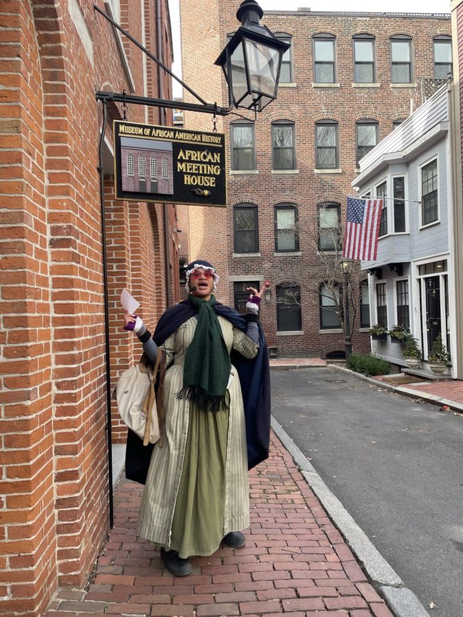 Tour guide Kelli Strong, dressed as Phylis Wheatley stands in front of the African Meeting House. African American Patriots tours are offered by the Freedom Trail throughout February.