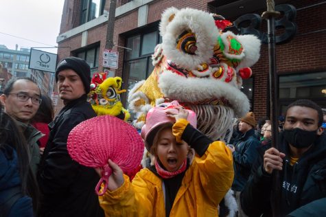 Performers push through the crowd during the annual Lunar New Year Parade in Chinatown’s Phillips Square Sunday, Jan. 29. 2023 marks the Year of the Rabbit in the Chinese Zodiac or the Year of the Cat for Vietnam’s Tết.