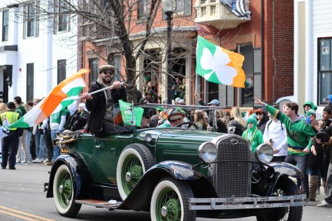 A man waves an Irish flag during the St. Patricks Day Parade Sunday. The parade drew over a million people to South Boston to celebrate the holiday.