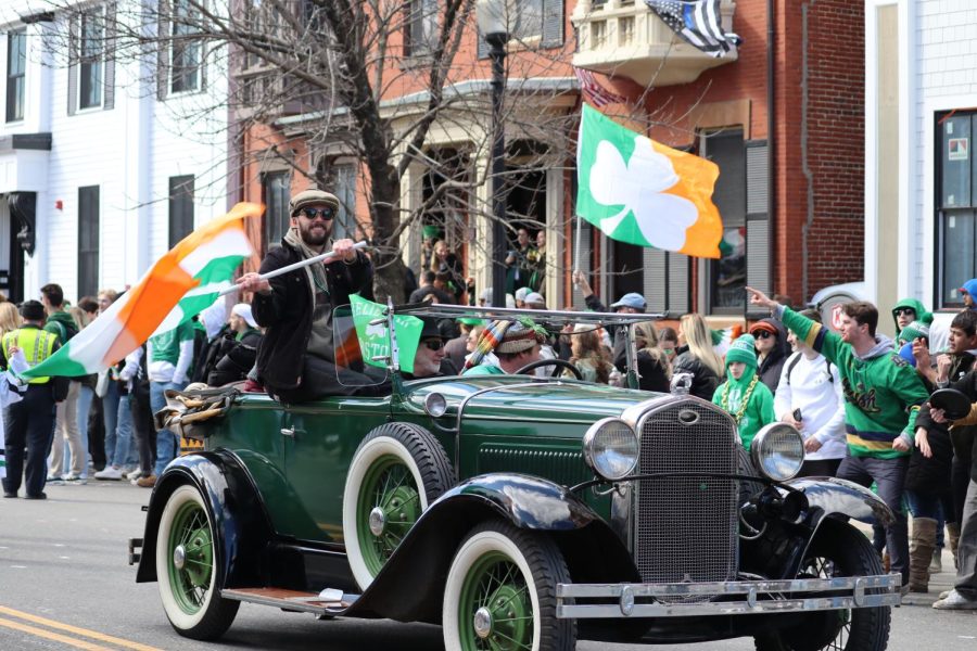 A+man+waves+an+Irish+flag+during+the+St.+Patricks+Day+Parade+Sunday.+The+parade+drew+over+a+million+people+to+South+Boston+to+celebrate+the+holiday.