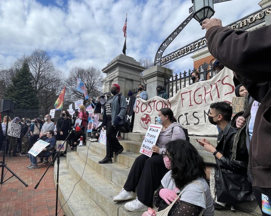 A protestor gives a speech in front of the crowd on the stairs of the Massachusetts State House. The protest was organized by Stop Trans Genocide, who demands that Massachusetts become a sanctuary state for transgender people who need it.