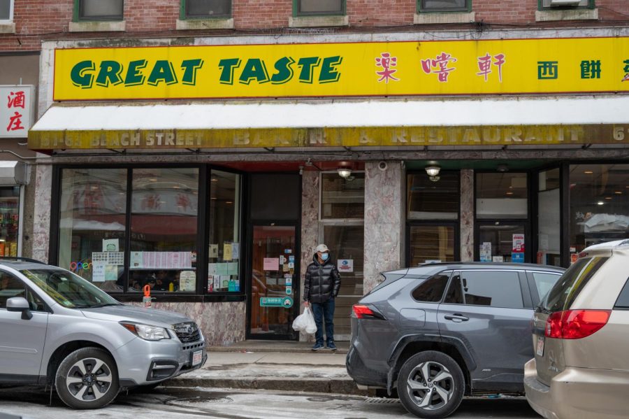 A man stands outside Great Taste Bakery and Restaurant on Beach Street. Customers are offered the choice of either dining in the restaurant portion of the store or grabbing quick items from the conjoined bakery section.