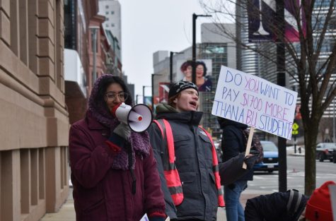 YDSA protestors gather outside Aouns office Feb. 25 with posters and a megaphone. The protestors called for the administration to take steps to make meal plans more accessible as part of the clubs No Hungry Huskies campaign. photo courtesy of Northeastern YDSA.