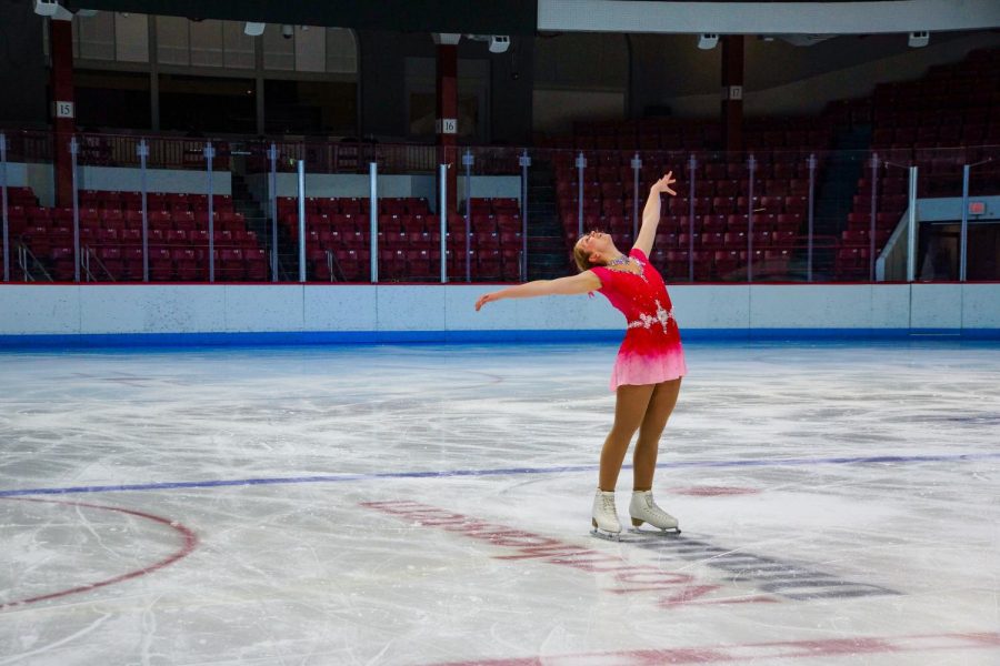 First-year Danielle Mazo strikes a pose during the Northeastern club figure skating team’s spring showcase. The event was its first of its kind for the team. 