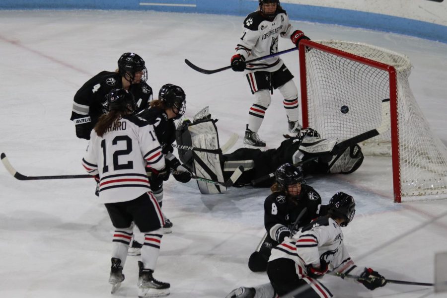 Graduate student forward and captain Alina Müller scores the equalizer in the Hockey East tournament championship against Providence College. Northeastern defeated the Friars 4-1 to take home the trophy.
