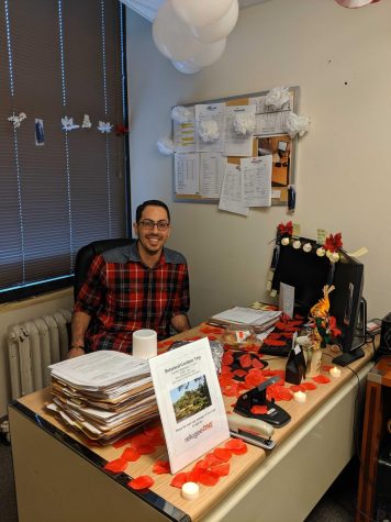 Tarokh in his office where he worked as a refugee case manager prior to pursuing his doctorate at Northeastern University. 