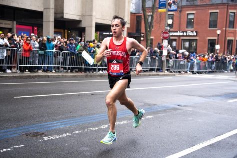 Vincent Castronuovo runs down the final stretch of the 26.2 mile Boston Marathon course. Castronuovo was the fastest male Boston resident to finish the race, and recieved an inaugural award from Mayor Michelle Wu. Photo courtesy Vincent Castronuovo