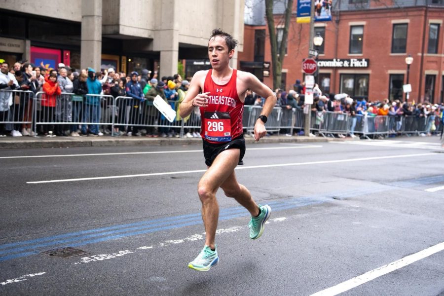 Vincent+Castronuovo+runs+down+the+final+stretch+of+the+26.2+mile+Boston+Marathon+course.+Castronuovo+was+the+fastest+male+Boston+resident+to+finish+the+race%2C+and+recieved+an+inaugural+award+from+Mayor+Michelle+Wu.+Photo+courtesy+Vincent+Castronuovo