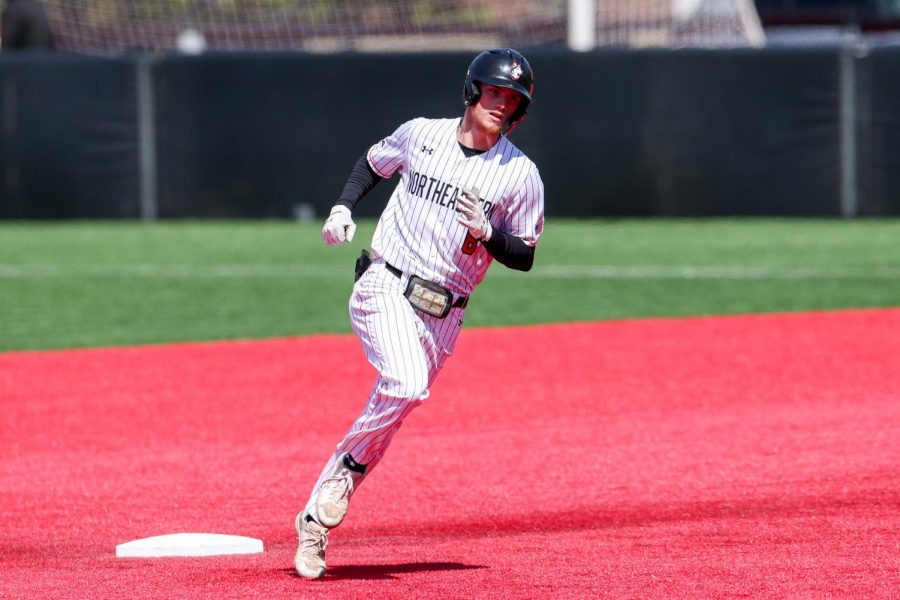 Sophomore+center+fielder+Mike+Sirota+jogs+around+the+bases+after+slamming+a+home+run+in+Fridays+game+against+Hofstra.+The+homer+was+his+first+of+two+throughout+the+weekend.