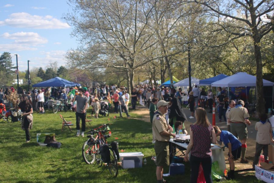 Community members gather in the park for the 2023 Wake Up the Earth festival. This tradition was created in 1979 to commemorate successful activism against a highway being built through Jamaica Plain.