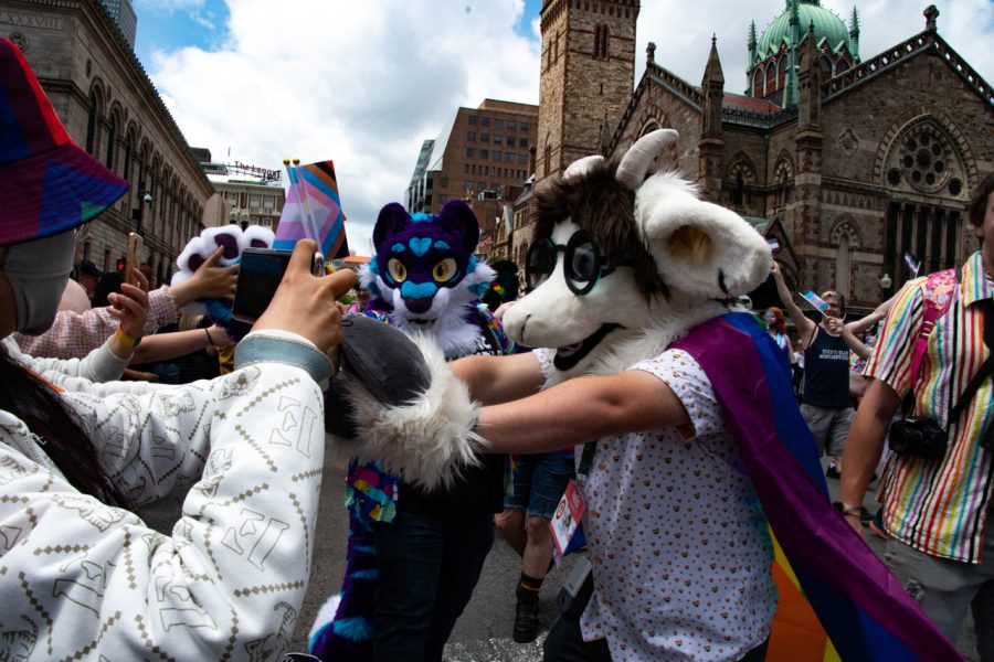 A person dressed as their fursona, a mountain goat, greets spectors. The Pride Parade offered an opportunity for various subcultures within the LGBTQ+ community to celebrate pride together.