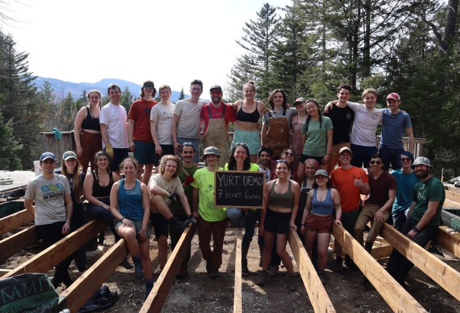 NUHOC members pose for a group photo while building a yurt, which serves as a placeholder for the lodge that burnt down in 2015. The club has been fundraising to rebuild the lodge with the help of alumni. Photo courtesy NUHOC.