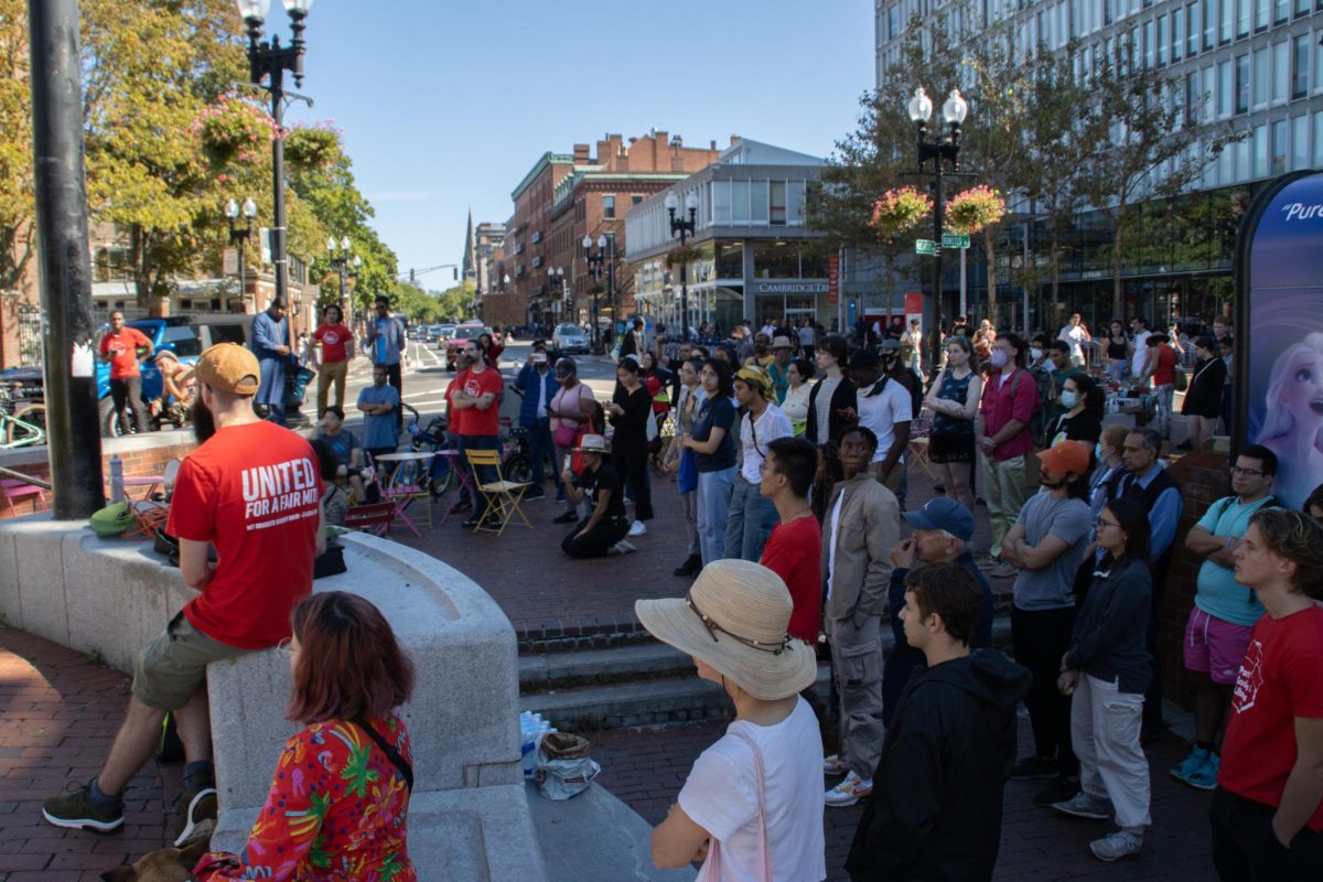 A crowd of people gather in Harvard Square Sept. 17 to rally for more transparency involving the death of Arif Sayed Faisal. Protestors campaigned for more details such as the names of the officers involved in Faisals death.