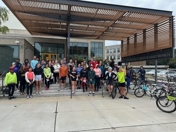 Participants gather in front of the Roxbury branch of the Boston Public Library before starting their routes. This event, in partnership with Heartbreak Hill Running Company, encouraged residents to explore the various locations of the BPL.