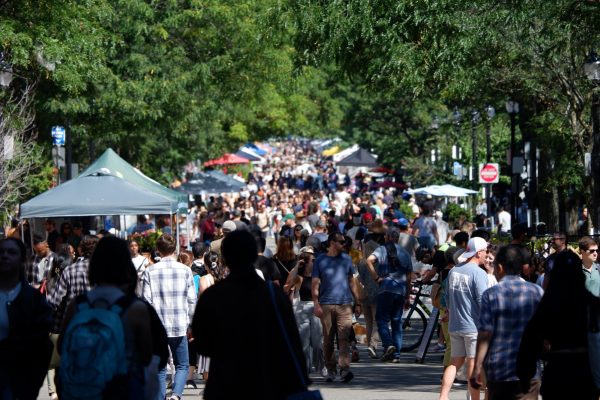 A huge crowd is seen walking down Newbury Street. Sunday’s Open Newbury Street event attracted thousands of people.