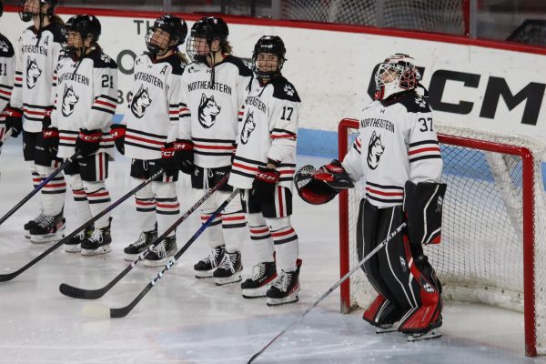 The Northeastern women’s hockey team lines up ahead of a game. They have been the top team in Hockey East for six straight seasons.