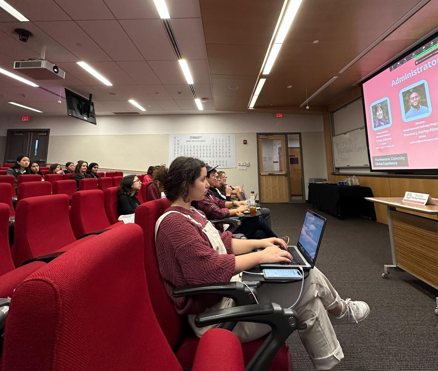 Attendees listen to the moderators and panelists at SGAs Global Campus Town Hall Oct. 12. Many students attended hoping to provide feedback on Northeasterns NU Bound, N.U.in and Global Scholar programs.