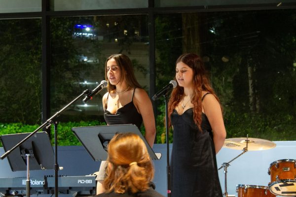 Eve Gujral and Sofia Núñez perform a duet together. The So Big, So Small cabaret event hosted by NU Stage gave new members the opportunity to get involved by pairing up with a senior member of the club.