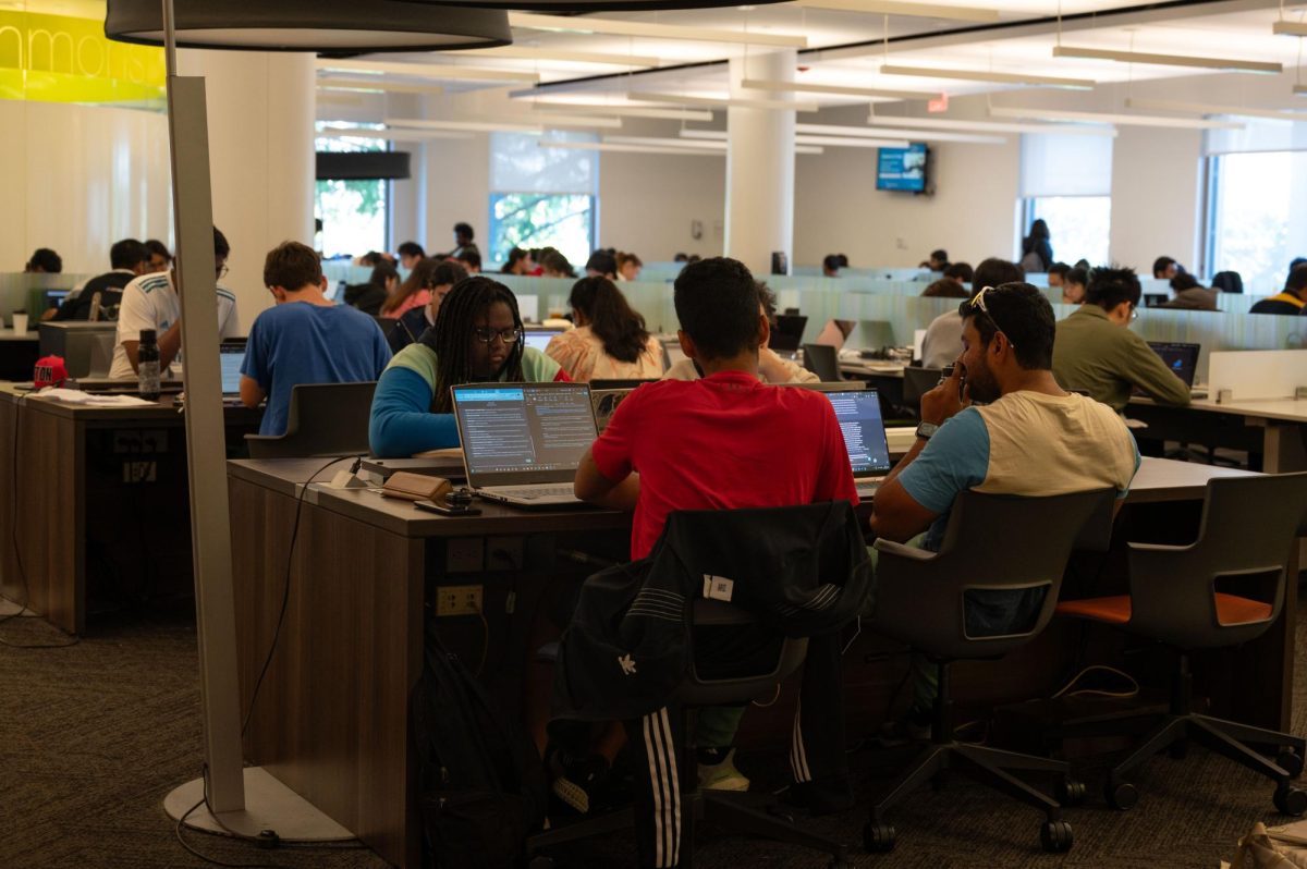 Students sit in Snell Library. Some students have complained about the lack of quiet in the library, claiming it has impacted their ability to get work done.