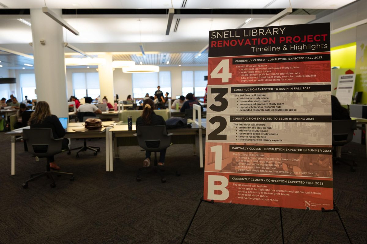 A sign displaying how the Snell Library Renovation Project will affect all floors stands on the first floor of the library. Students shared that they believe Northeastern should focus on providing more quiet spaces for students.