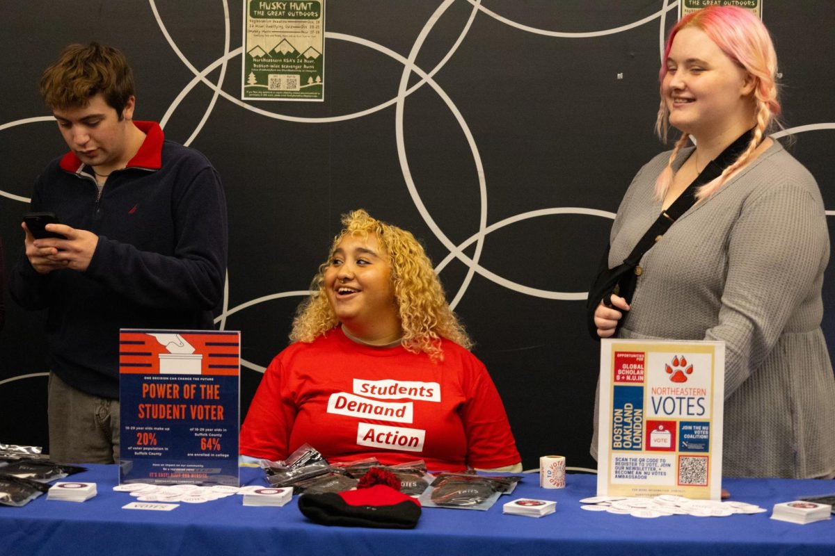 Members of Students Demand Action table at a voter registration event in Curry Student Center. The Northeastern chapter of SDA was founded this fall.
