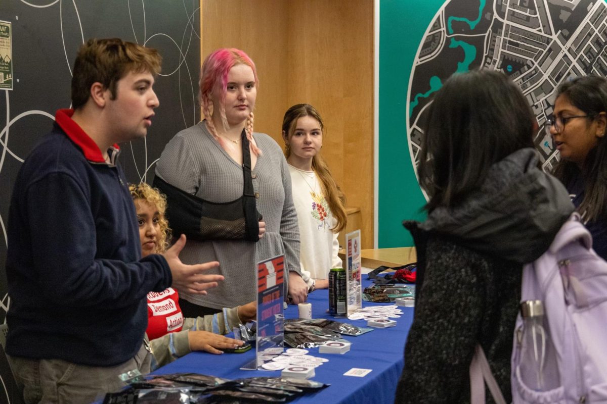 Members of SDA talk to students about voter registration. Many members of the organization have not had previous opportunities to get involved with gun control advocacy.