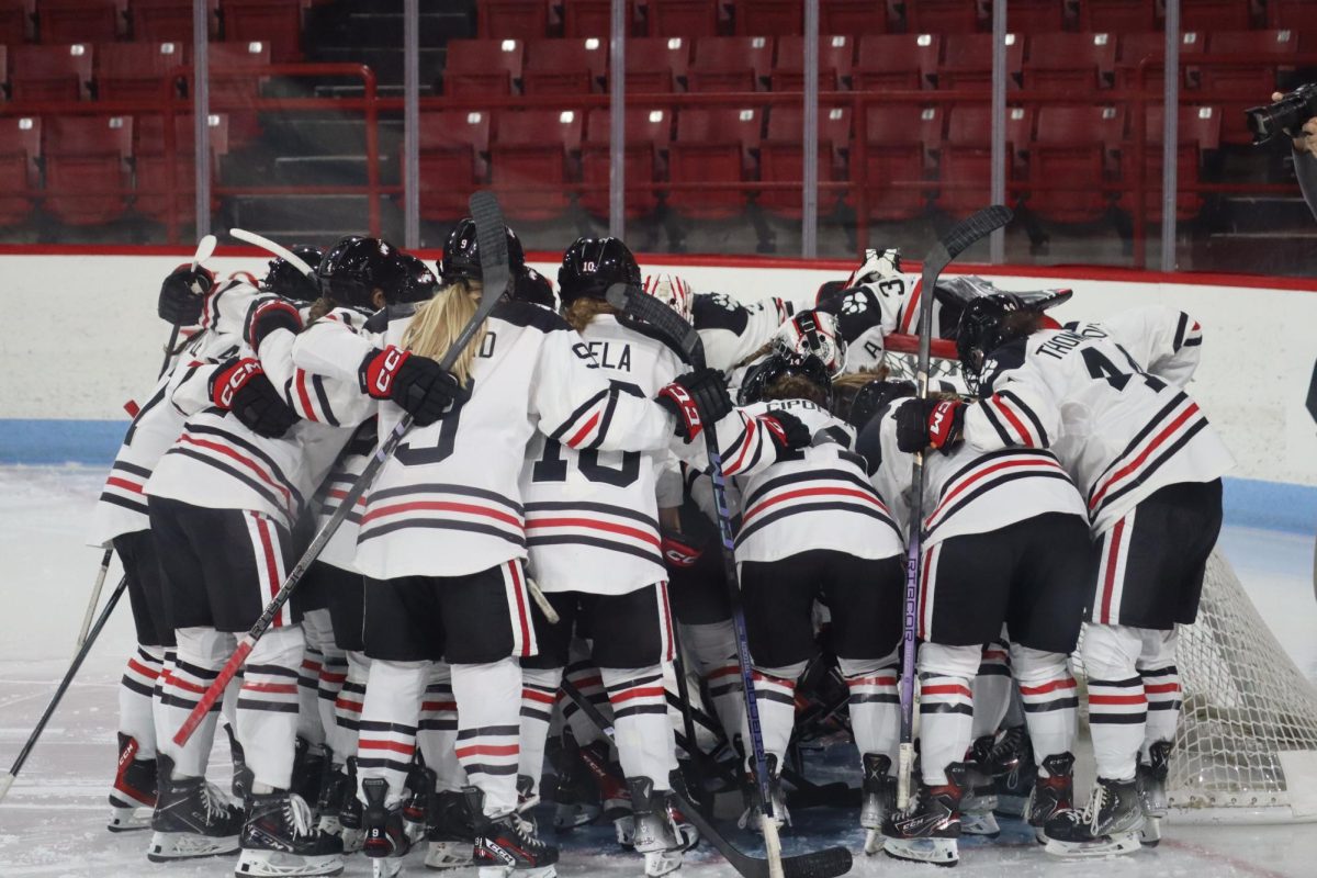 The Northeastern womens hockey team huddles before a game earlier this season. The Huskies competed in the Ice Breaker Tournament at Sacred Heart University Oct. 20-21. 