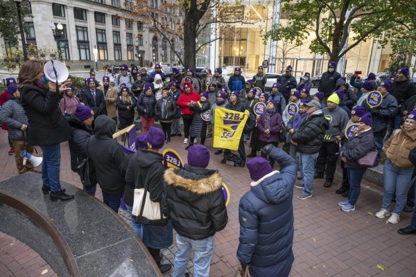 A crowd of union members and supporters gather in Post Office Square in downtown Boston following a tentative new contract agreement. The updated contract included the conversion of 500 part-time jobs to full-time positions. Photo courtesy 32BJ SEIU and Ann Hermes.