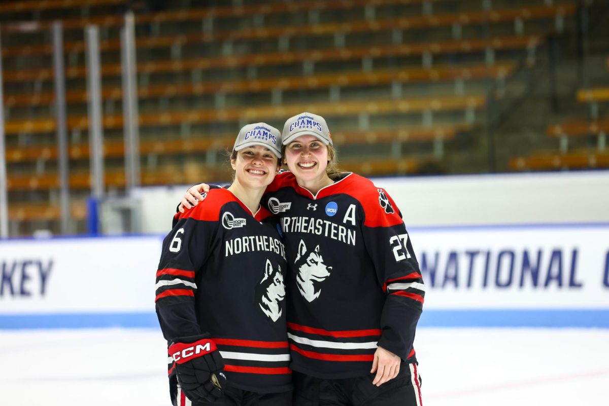 Megan Carter and Katy Knoll skate together at Matthews Arena. They both joined Northeastern womens hockey team in 2019 and have been close friends ever since.