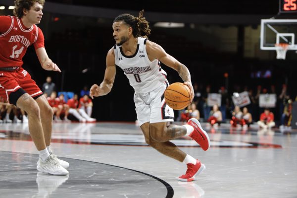 Joe Pridgen takes the ball into the paint for Northeastern. Northeastern faced Old Dominion University Dec. 2 and came away with a win, 81-68.