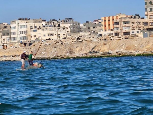 In a photo taken by Abukwaik’s father, two people paddle through the Port of Gaza. Abukwaik was contacted by a Northeastern Global News journalist in mid-October during the escalating Israel-Hamas war. Photo courtesy Sarah Abukwaik.