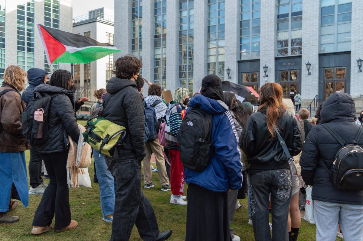 Students rally outside of Ell Hall to protest Northeasterns disciplinary charges against students involved in a Dec. 1 sit-in organized by Huskies for a Free Palestine. According to the student group, three students had disciplinary hearings Jan. 10.
