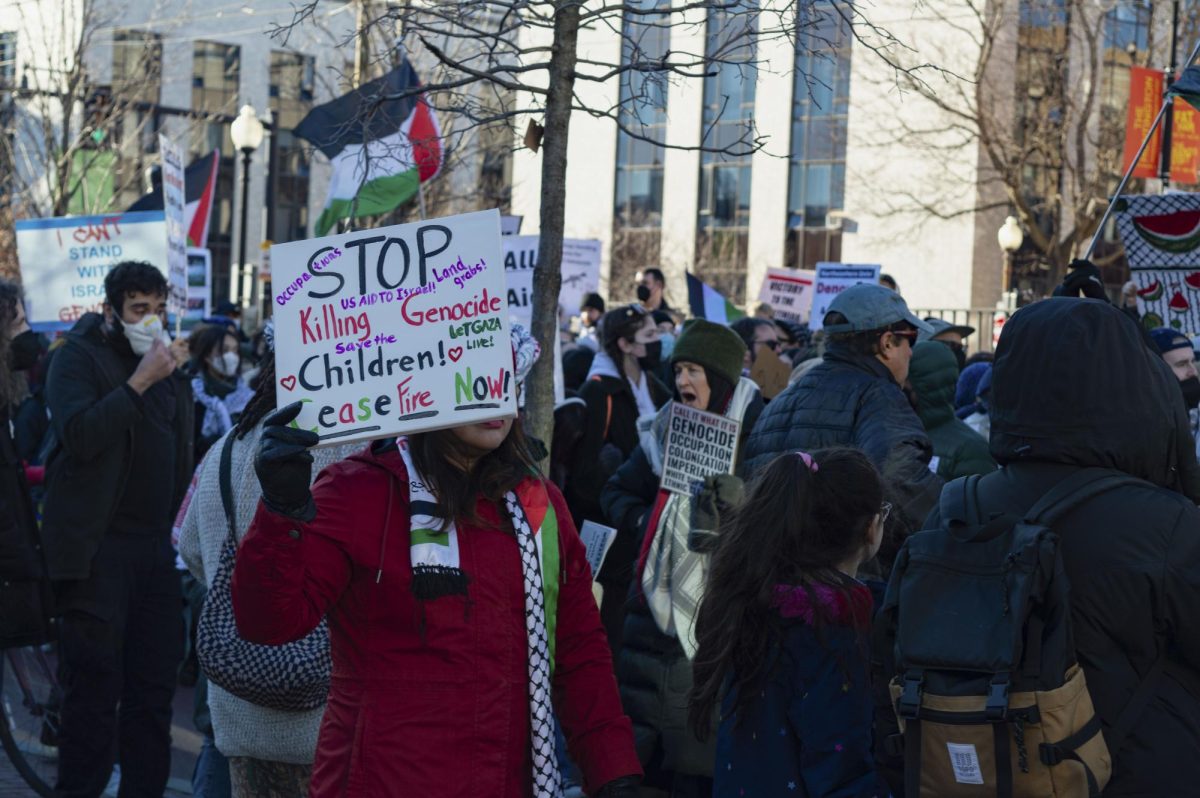 A protestor carries a sign with pro-Palestine messaging calling for a ceasefire in Gaza during a rally organized by the Boston Coalition for Palestine Feb. 4. Read more here.