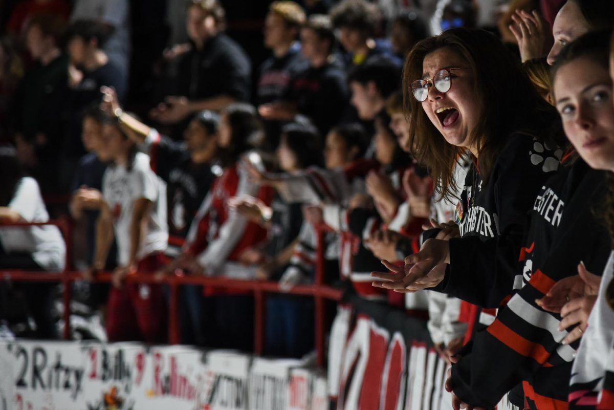 A student fan screams, reacting to in-game action. Many fans, especially those near the front of the DogHouse, emoted, chanted and poked their heads over the railings when voicing their feelings and thoughts throughout the game.