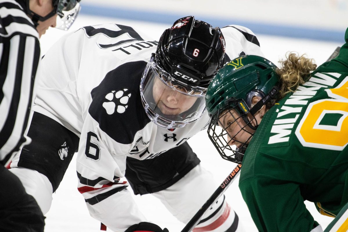 Fifth-year forward Katy Knoll and senior forward Natálie Mlýnková from the University of Vermont wait for the puck to drop during the Northeastern womens hockey senior night game Feb. 24. Read more here.