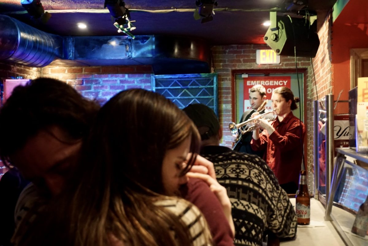 A couple at the bar embrace during Kokufukata’s trumpet solo. While initially pretty quiet, the bar filled up by 9 p.m. “Whats good for the customers is that they can get an intimate performance, intimate view of young musicians who they will probably have to pay $50, $60 within years to be able to see perform,” Poindexter said.