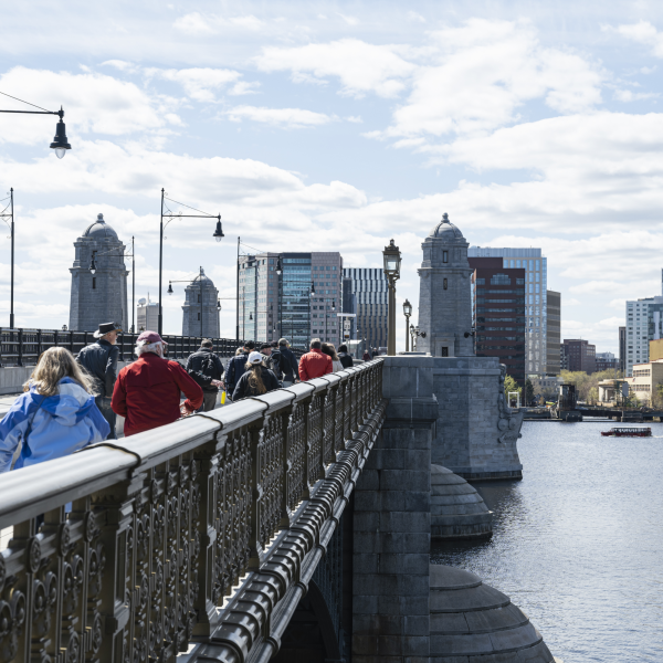 A group crosses the Longfellow Bridge from Boston into Cambridge during a guided tour of The Innovation Trail. The tour has allowed visitors to learn about various scientific and technological discoveries in Boston and Cambridge. Photo courtesy Ben Gebo Photography, The Innovation Trail of Greater Boston.