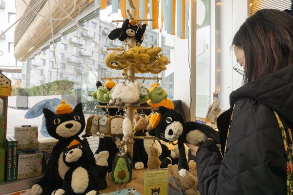 A tree-like display of Jellycat keychains is placed next to numerous Jellycat Jacks, plushies based off the company’s tuxedo cat mascot. Jellycat released a new collection for their 25th anniversary.