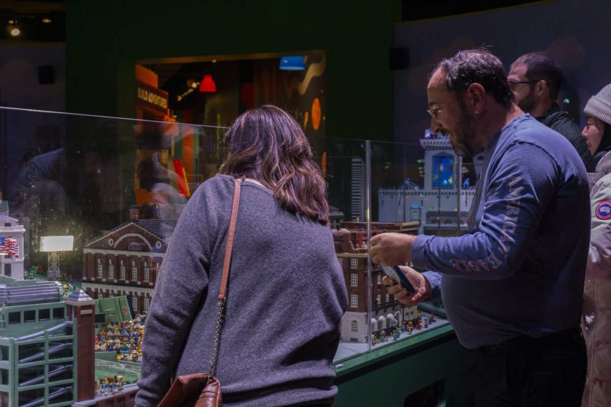 A couple admires a Lego model of Fenway Park. There were also Lego models of the Prudential Center and John Hancock Tower.